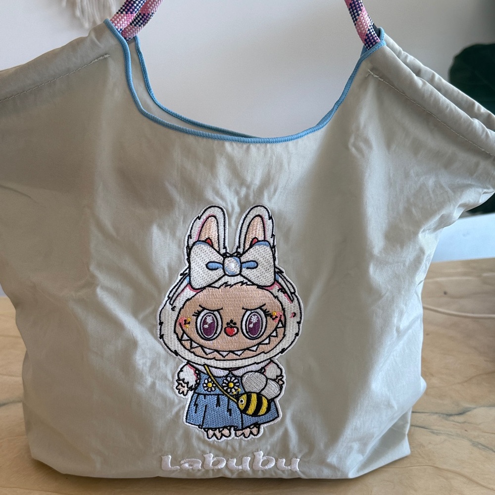 Ball & Chain Labubu bag.